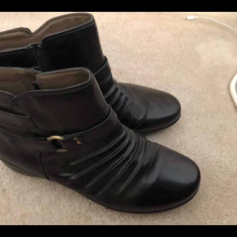 Black booties. Faux leather,
